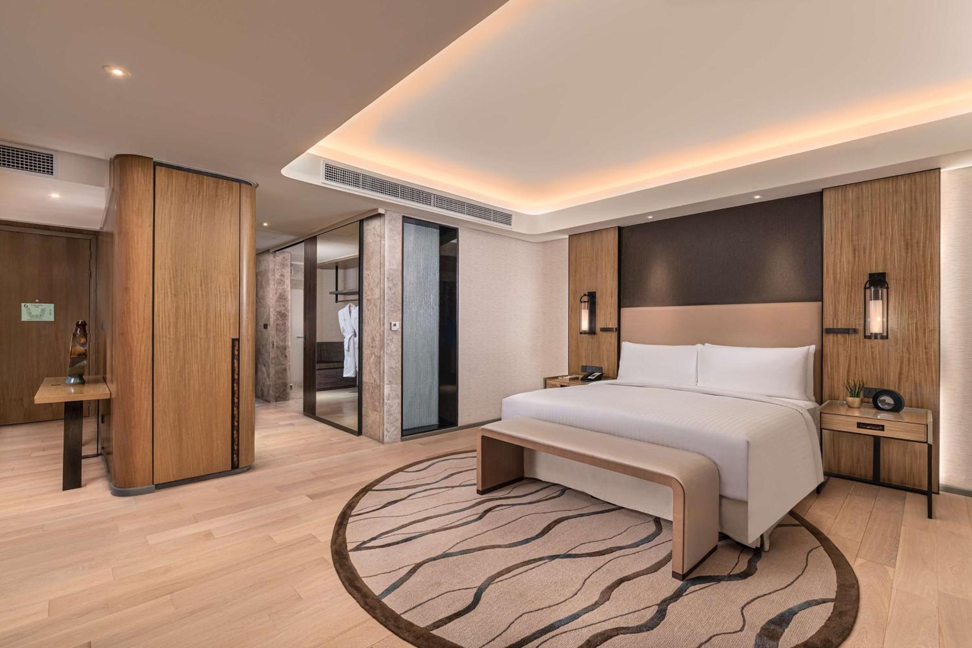 Hotel Conrad Manila Pasay Exterior foto A bedroom at the hotel